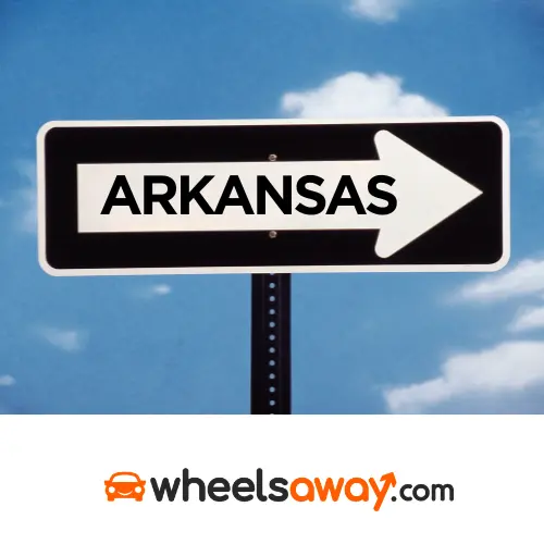 arkansas road sign with wheelsaway logo