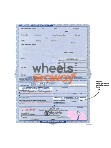 Nebraska vehicle title with sellers printed name and signature