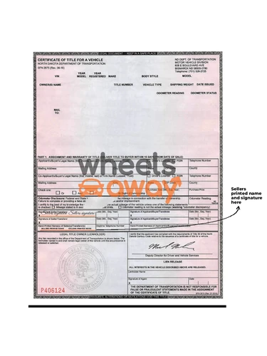 North Dakota vehicle title with sellers printed name and signatures